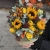 Композиция в сумке "Тональность" из подсолнухов, калл, ягод вибирнума, лимонных роз, скиммии и орхидеи в Химках Композиция в сумке "Тональность" из подсолнухов, калл, ягод вибирнума, лимонных роз, скиммии и орхидеи в Химках